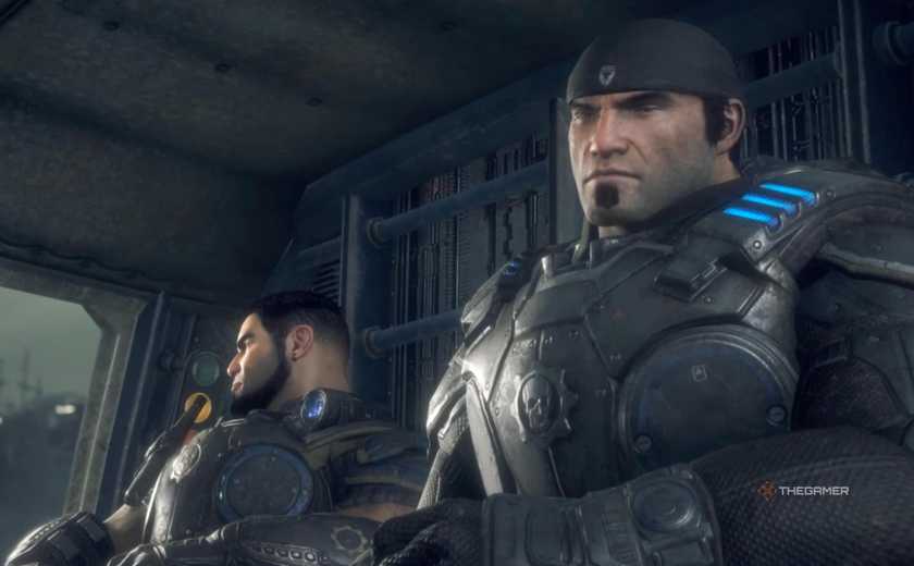 Marcus and Dom sitting in a vehicle in Gears of War: Reloaded.